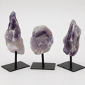 Regal Rebel 22 presents The Rough Amethyst on Metal Stand