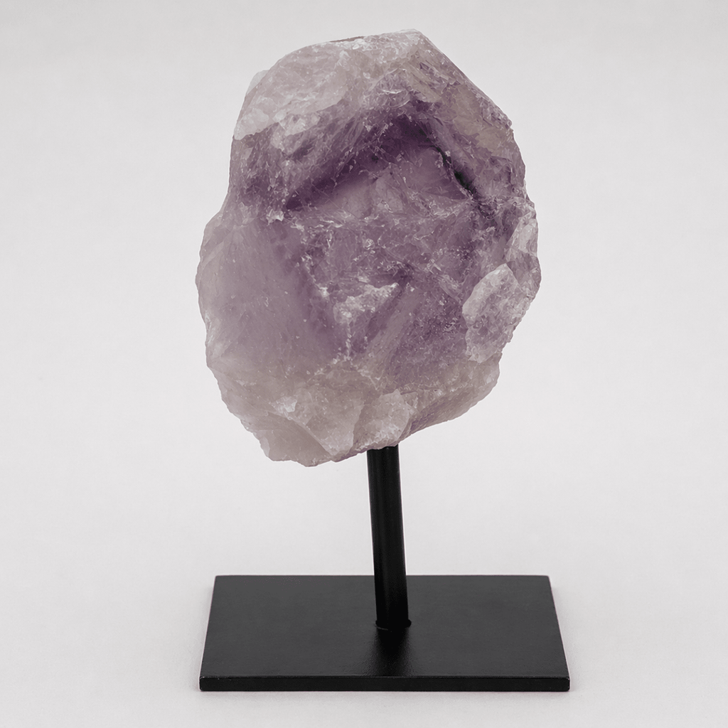 Regal Rebel 22 presents The Rough Amethyst on Metal Stand