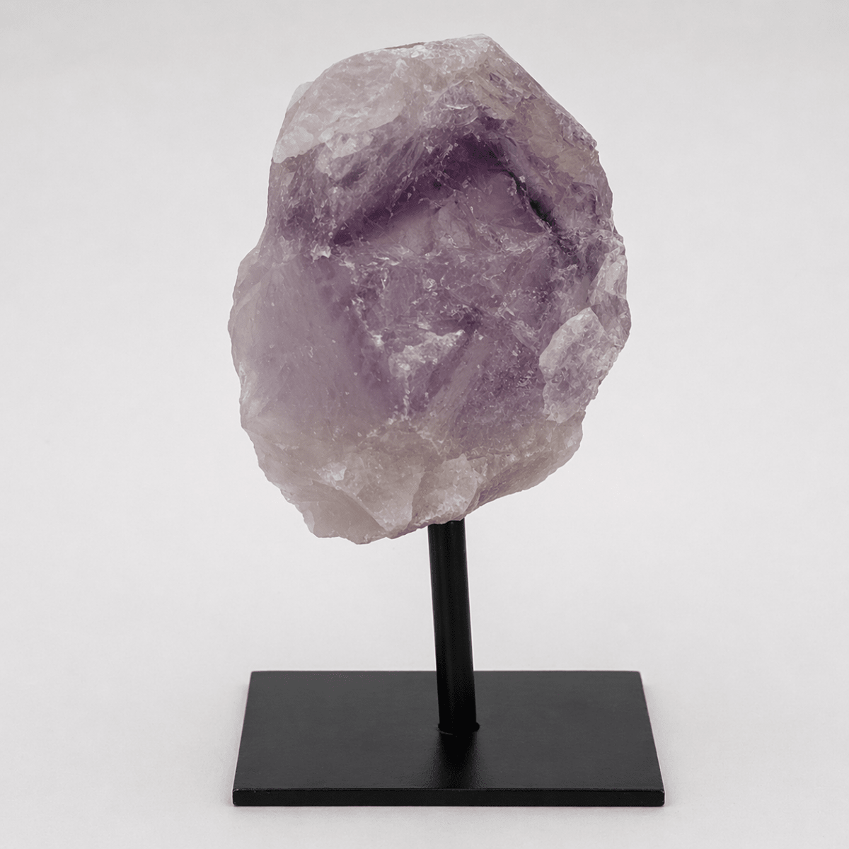 Regal Rebel 22 presents The Rough Amethyst on Metal Stand