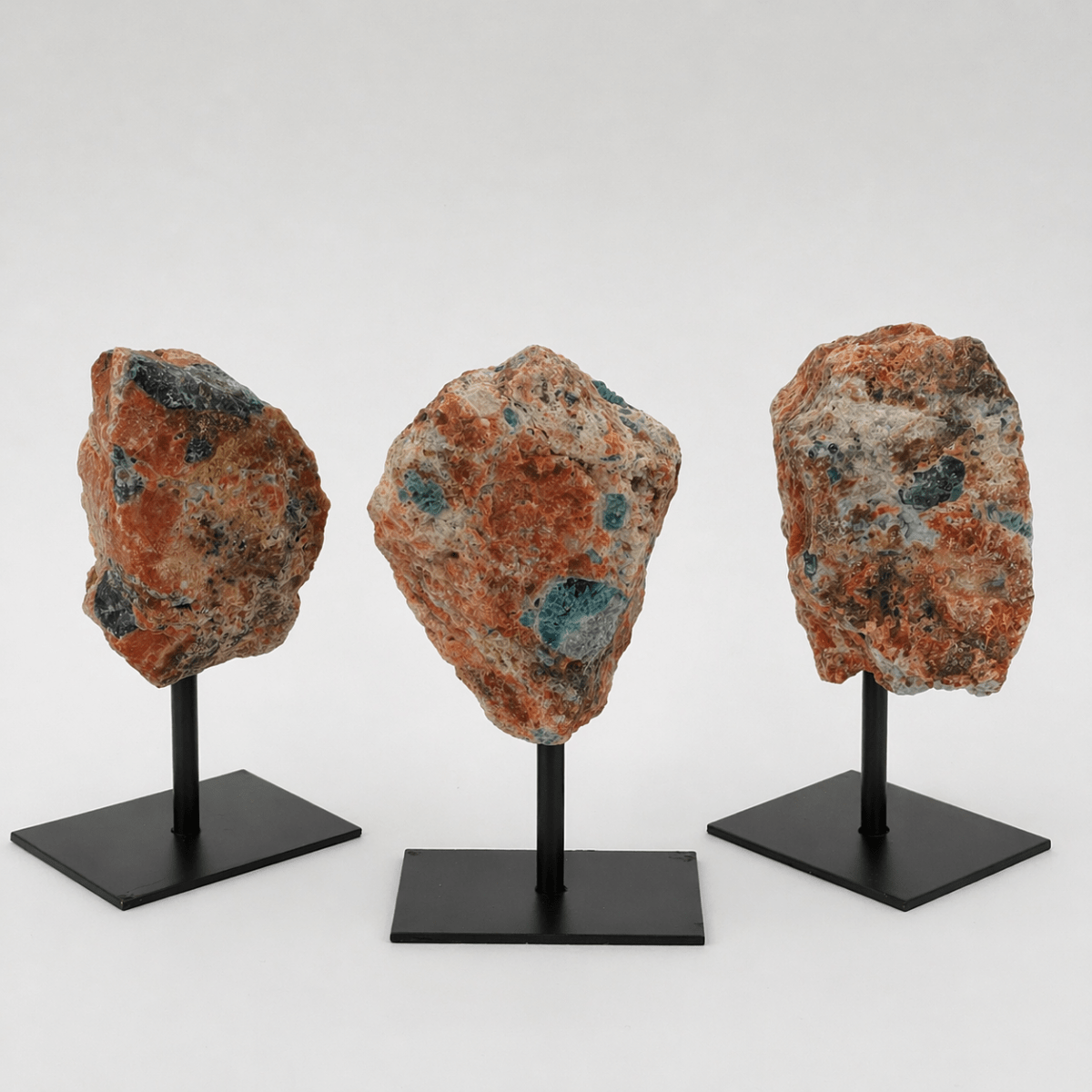 Regal Rebel 22 presents The Rough Apatite on Calcite Matrix on Metal Stand